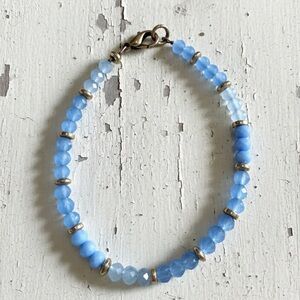 Linen Blue Crystal Beaded Bracelet with Gold Hematite on a Lobster Clasp